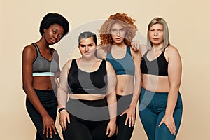 Different Race. Diversity Figure And Size Models Portrait. International Friends In Sportswear Posing.