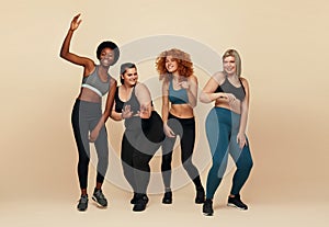 Different Race. Diversity Figure And Size Women Full-Length Portrait. Group Of Multicultural Friends In Sportswear Posing.