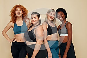 Different Race. Diversity Figure And Size Women Portrait. Smiling Multiethnic Female In Sportswear Posing.