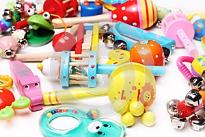 Different rattles for babies background photo