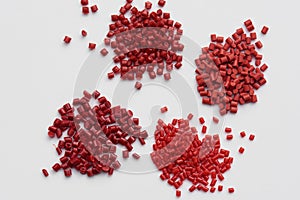 Different red plastic resins with processed comb