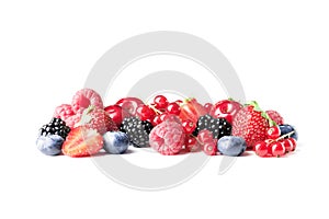 Different ripe tasty berries on white background such as strawberries