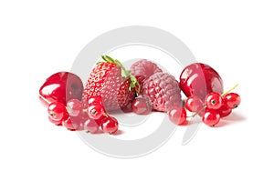 Different ripe tasty berries on white background such as strawberries