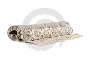 Different rolled carpets on white background
