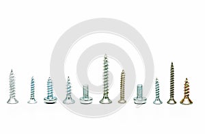 Different screws and bolts on a white background