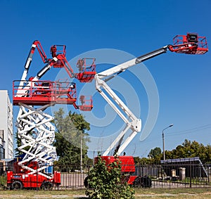 Different self propelled articulated boom lifts and one scissor lift