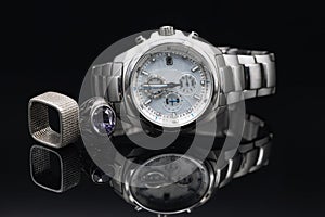 Different shades of silver: titanium watches, silver rings and chain