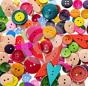 Different shape and colors sewing buttons background. Colorful t