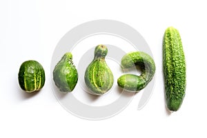 Different shape fresh cucumbers on white background