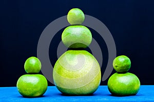 Different shapes sets from green citruses fruits. Limes, pomelo, grapefruits.