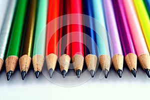 Different Sharpened Colorful Pencils and erasers