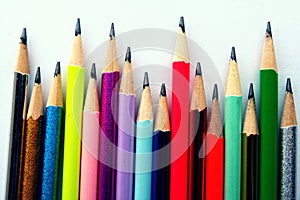 Different Sharpened Colorful Pencils and erasers