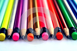 Different Sharpened Colorful Pencils and erasers
