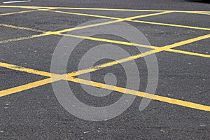 Different signs and marking painted on the ashpalt of streets and roads