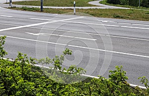 Different signs and marking painted on the ashpalt of streets and roads