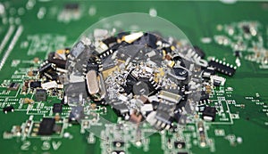 Different size SMT components pile on a PCB.