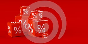 Different sized stacked red cubes or dice with percent sign symbol on red background, sale, discount or sales price reduction