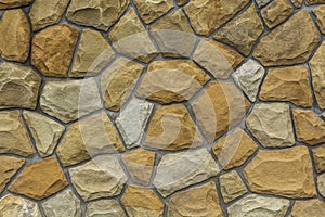 Different sizes of sand stones. Stone wall pattern background