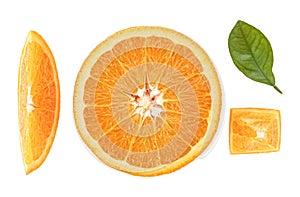 Different slices of orange fruit and orange leaf isolated on white background, top view. Vitamin C, Detox conception