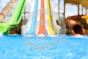 Different slides in water park, blurred view