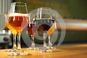 Different sorts of beer on bar counter