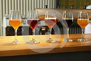 Different sorts of beer on bar counter