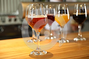 Different sorts of beer on bar counter