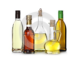 Different sorts of cooking oil in bottles isolated