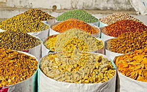 Different spices and food in street market, India