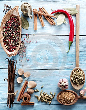 Different spices on old wood.