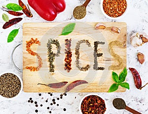 Different spices on white background. Top view