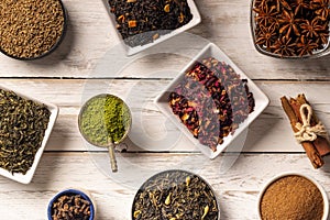 Different spices on wooden table