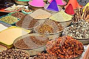 Different spicy and color powder for sell on street market in Gokarna. India