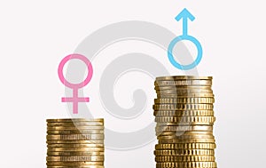 Different stacks of coins with male and female gender signs