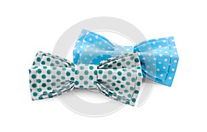 Different stylish bow ties on white background