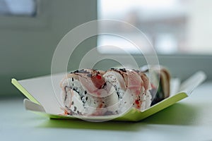 Different sushi delivery. Varieties of sushi for lunch or dinner.