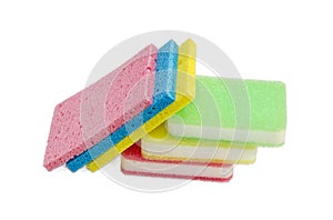 Different synthetic cleaning sponges on a light background