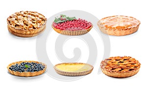 Different tasty fruit pies on white background photo