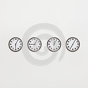 Different time zone clocks on wall. Conceptual image