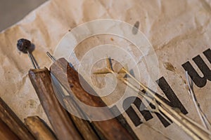 Different tools for handpainted easter eggs with wax