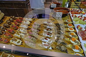 Different truffle panini close-up on the display. Appetizer, aperitive time. Italian cuisine. Florence central food market, food photo