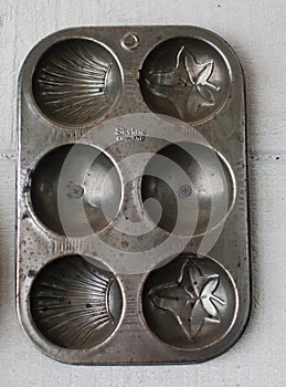 Different types of baking pans and moulds for cake, bread and muffins