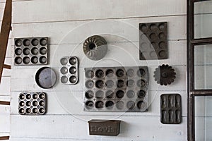 Different types of baking pans and moulds for cake, bread and muffins