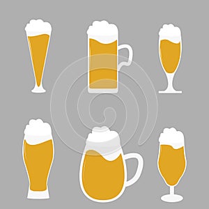 Different types of beer glasses with beer spilling