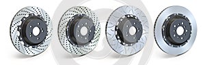 Different types of brake disks. Drilled and slotted brake disks in a row
