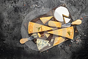 Different types of cheese. Cheeses mix set dor blu chedar camamber brie. place for text, top view