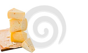 Different types of delisious cheese on wooden board isolated on white background