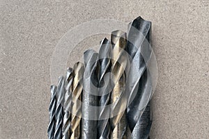 Different Types of Drill Bits. Old and worn-out drill bits in various sizes