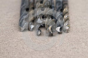 Different Types of Drill Bits. Old and worn-out drill bits in various sizes