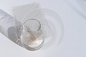 Different types of gelatin powder and sheets on white table